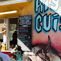 Families visiting Righteous Cuisine food truck.